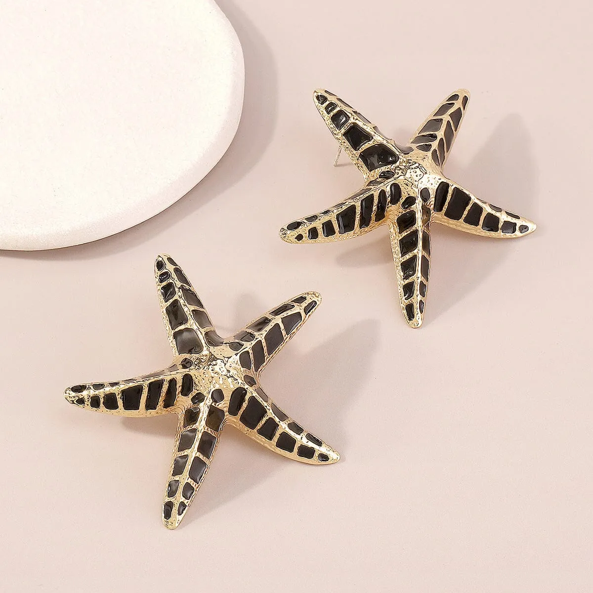 STARFISH EARRINGS IN BLACK Gloria Lanvin